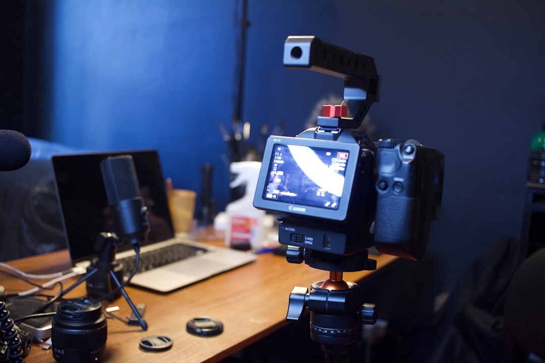 Professional camera mounted on a tripod in a production studio