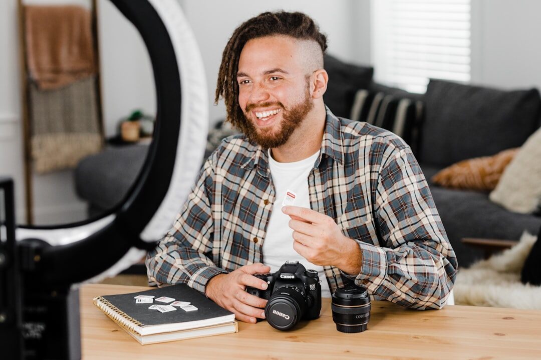 Content creator filming a short video with a ring light and tripod